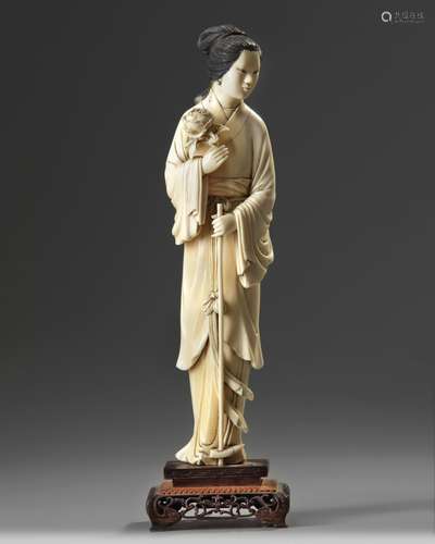 A Chinese ivory carving of a lady