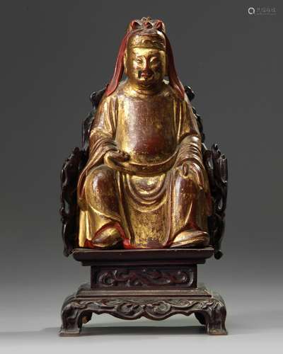 A Chinese gilt-lacquered wood figure of Wen Chang on a wooden throne