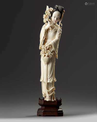 A Chinese ivory carving of a lady holding a flower basket