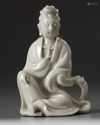 A Chinese Dehua white-glazed seated Guanyin