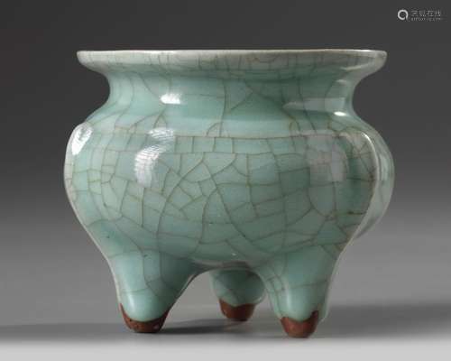 A Chinese celadon crackle-glazed tripod censer