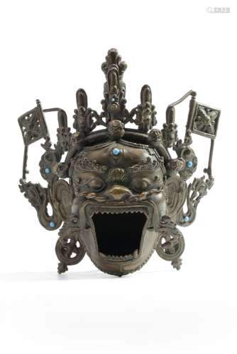 A Mongolian bronze Mahakala-head ritual water pot