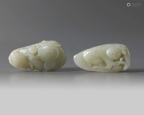 Two large Chinese pale celadon jade ‘boys’ carvings