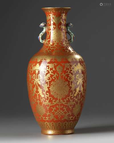 A Chinese coral-ground gilt-decorated slender vase