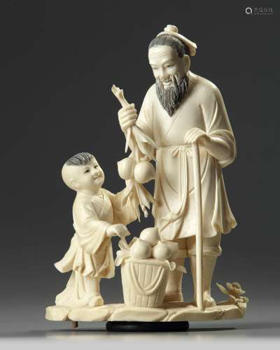 A Chinese carved ivory 'boy and scholar' group