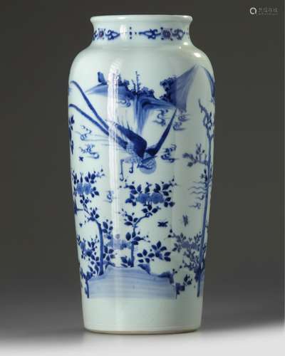 A Chinese Transitional-style blue and white sleeve vase