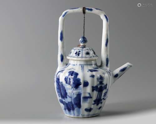 A Chinese blue and white moulded 'arch handle' teapot