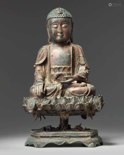 A Chinese gilt-lacquered bronze figure of Shakyamuni