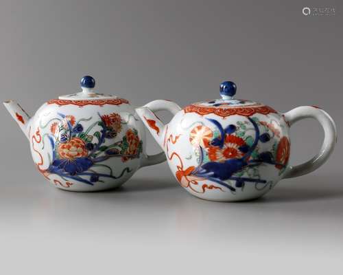 A pair of Chinese famille verte teapots