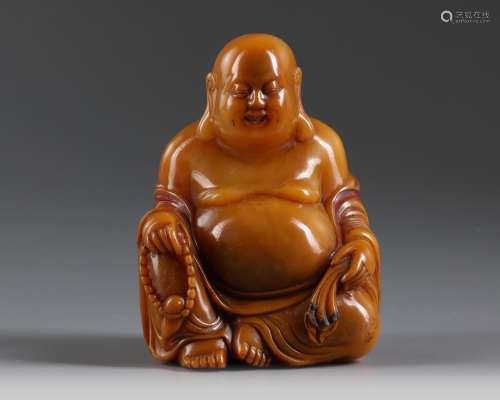 A Chinese soapstone figure of Budai