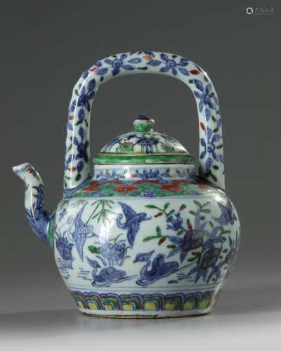 A later-enamelled Chinese blue and white teapot
