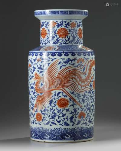 A large Chinese iron-red-decorated blue and white 'dragon and phoenix' rouleau vase