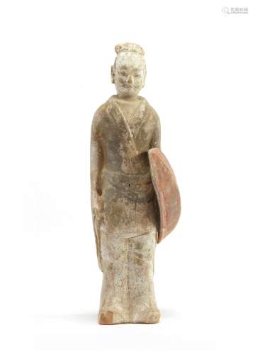 A Chinese painted pottery model of a standing warrior