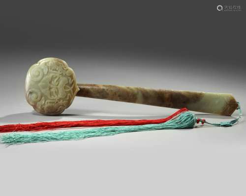 A large Chinese celadon and russet jade ruyi-sceptre