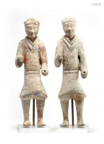 A pair of Chinese painted pottery standing soldiers