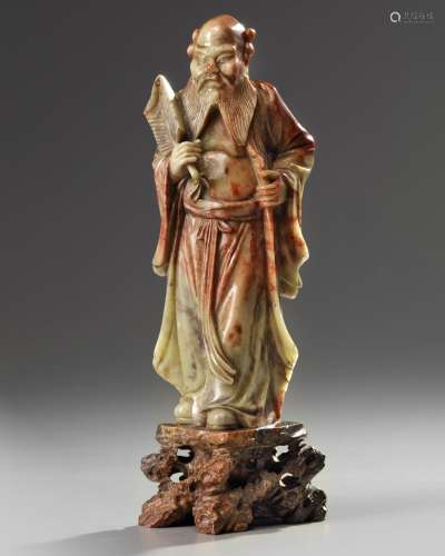 A Chinese soapstone figure of an Immortal