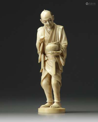 An ivory carving of a man holding a lantern