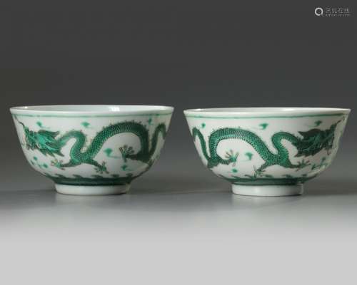 A pair of Chinese green glazed 'dragon' bowls