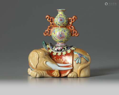 A Chinese famille rose caparisoned elephant joss stick holder