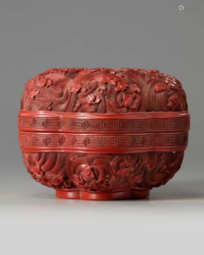 A Chinese cinnabar lacquer 'prunus' box and cover