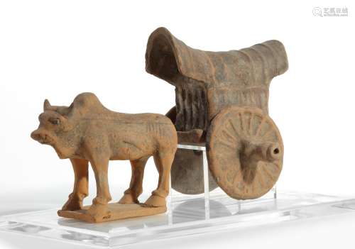 A Chinese terracotta model of an ox and cart