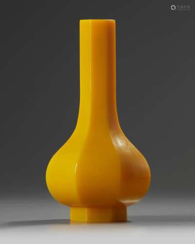 A Chinese yellow-glass octagonal bottle vase