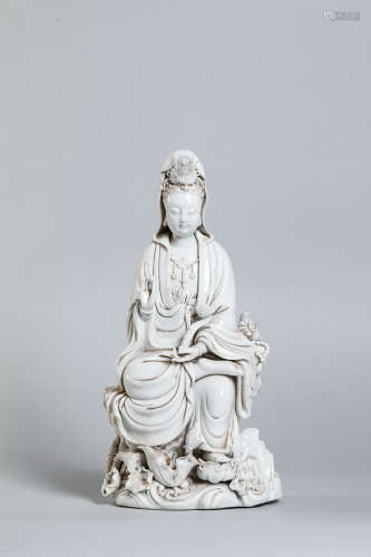 Le Boddhisattva Kwan Yin assis en délassement sur ...