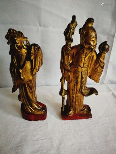 Paire de statuettes en bois doré illustrant Shou L...