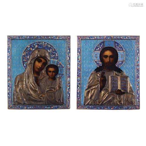 Pair of icons in partially gilded silver and polychrome