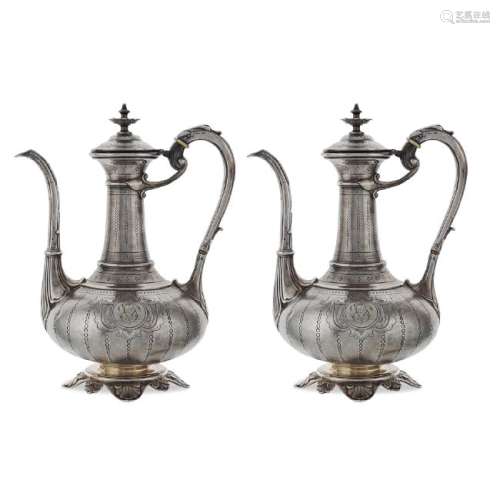 Two silver jugs 20th century Oriental manifacture peso