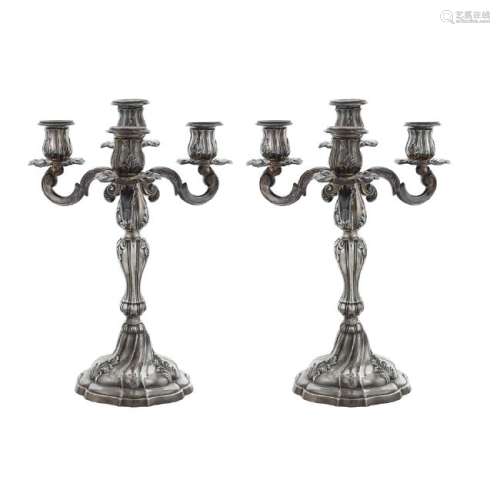 Pair of silver four lights chandeliers Italy, 20th
