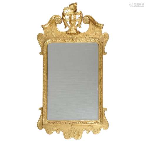 A George I giltwood and gesso wall mirror