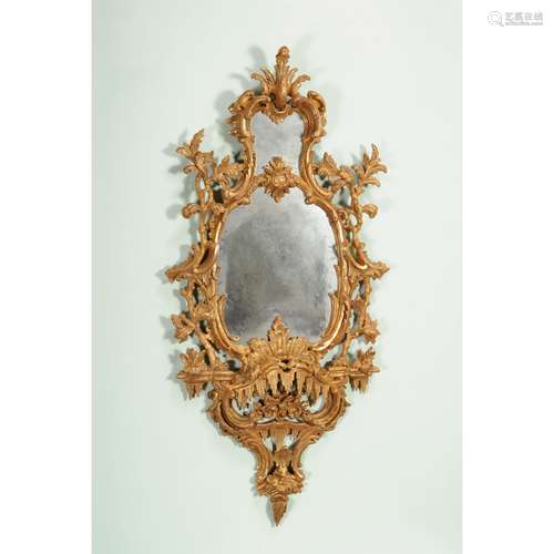 A  carved giltwood and gesso wall mirror