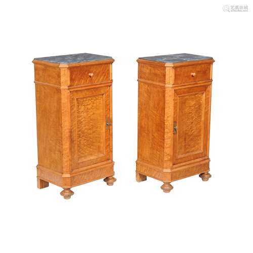 A pair of Continental bird’s eye maple and variegated grey marble mounted bedside cupboards