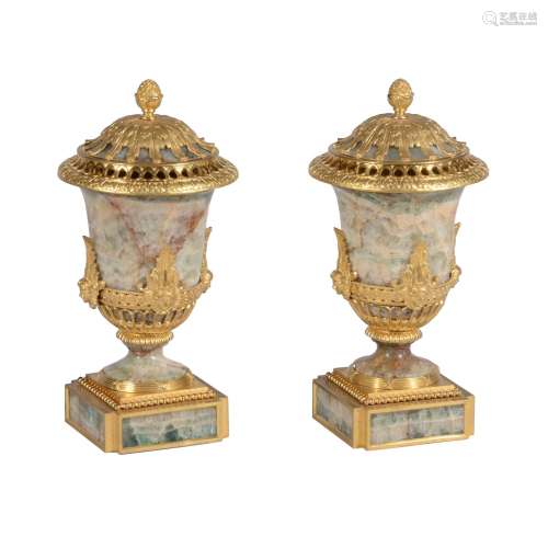 A pair of ormolu and green fluorspar perfume vases and covers