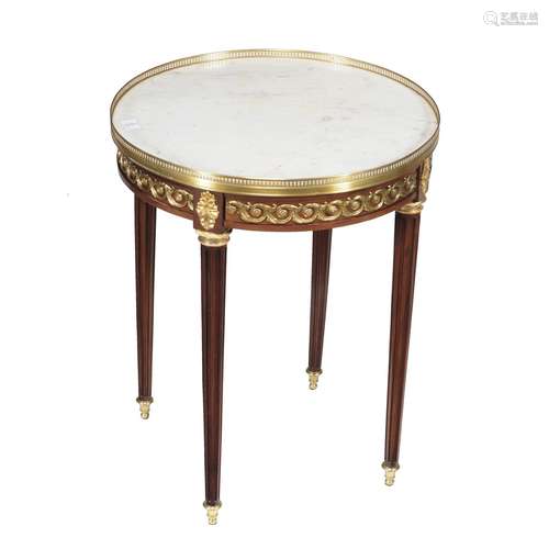 A French mahogany and gilt metal mounted gueridon table