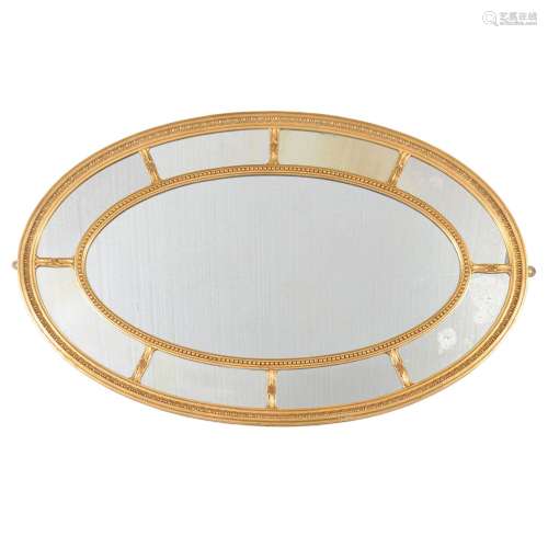 A George III oval wall mirror