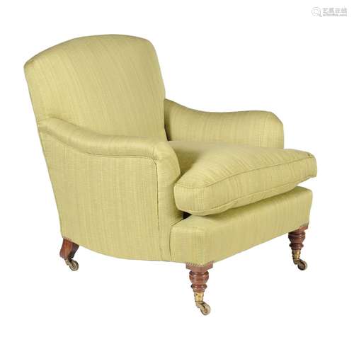 A Victorian walnut and upholstered armchair by HOWARD & SONS