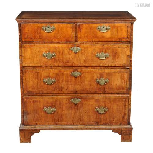 A George I walnut and feather banded chest of drawers