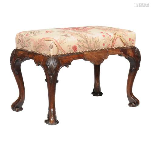 A George II walnut and upholstered stool