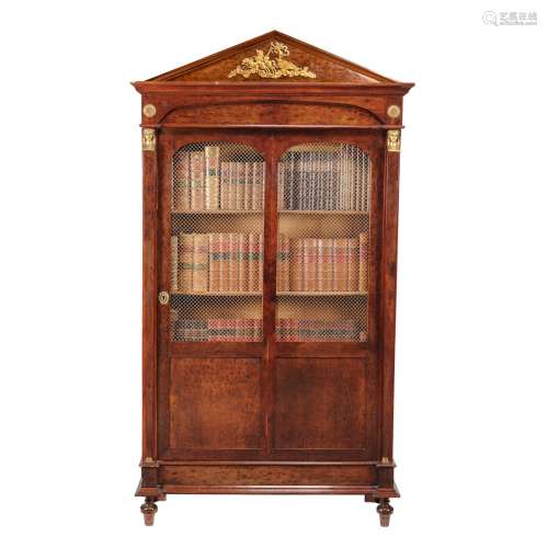 A pair of Louis Philippe plum pudding mahogany and gilt metal mounted bookcases