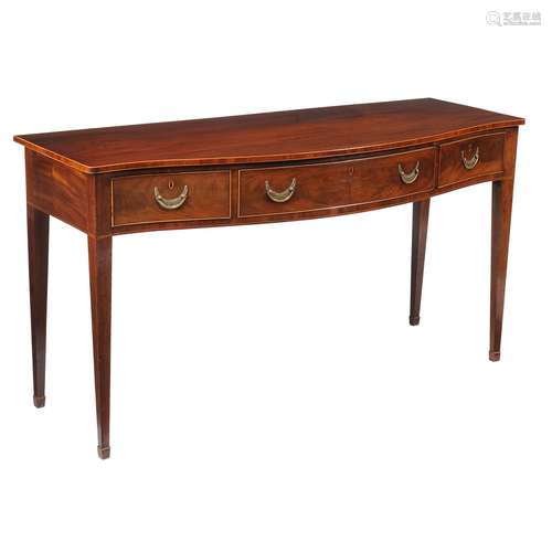 A George III mahogany serpentine fronted serving table