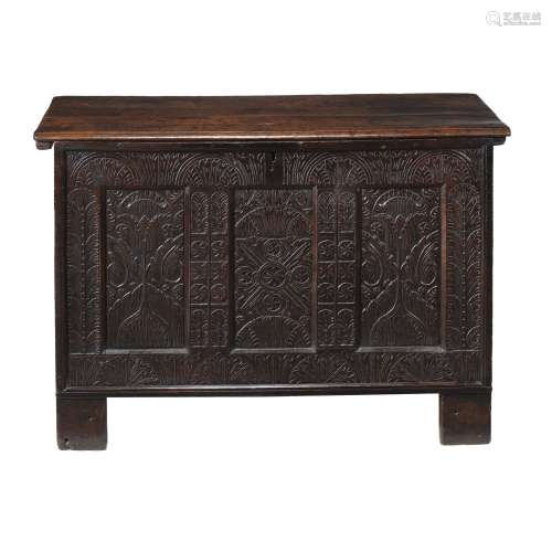 A 17th century oak three panel carved coffer