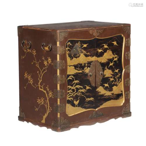 A Japanese lacquer and gilt decorated table cabinet