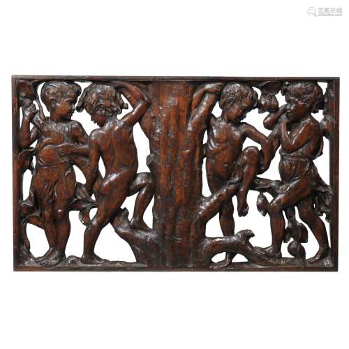 A pair of Arts & Crafts carved oak panels