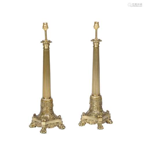 A pair of French cast metal columnar table lamps in Restauration taste