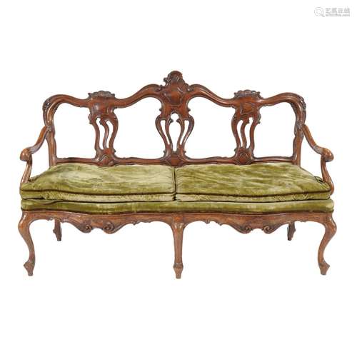 An Italian carved walnut chair back settee