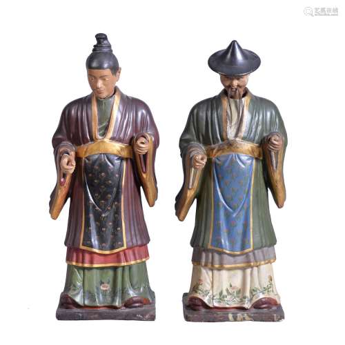 A pair of Continental painted and parcel gilt plaster models of Chinamen