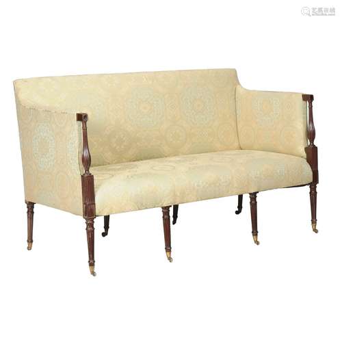 A mahogany and upholstered sofa