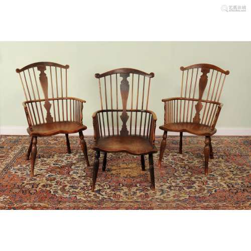 A companion set of three ash and elm Windsor armchairs